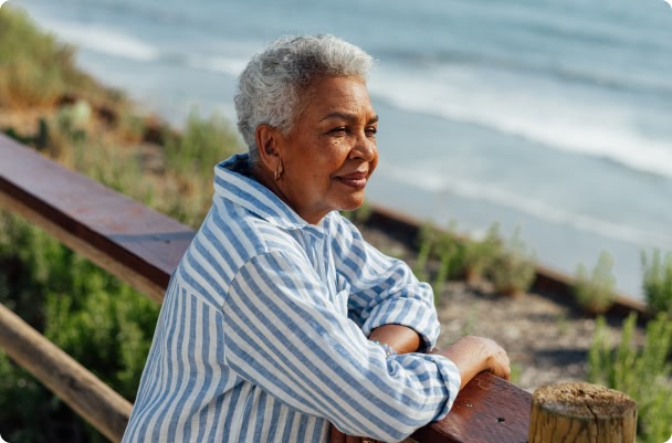 woman looking at the ocean