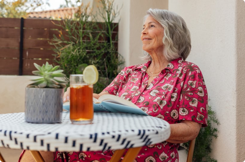 woman reading a book outside